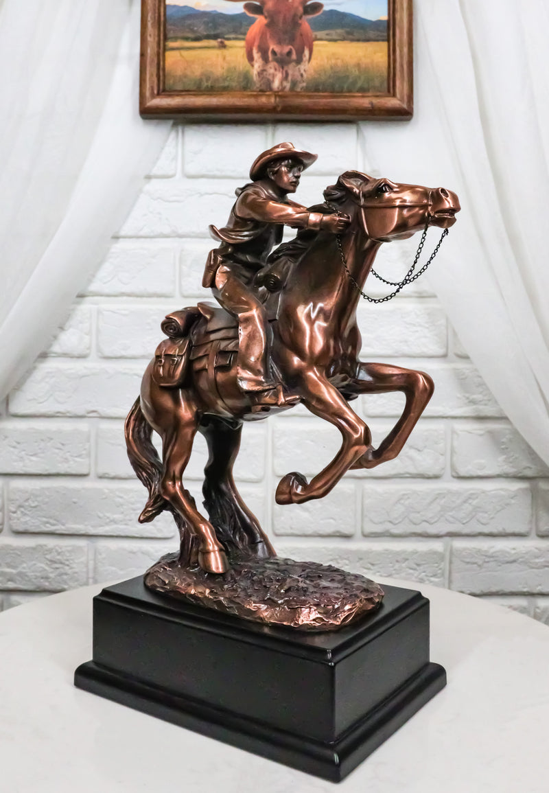 Rustic Western Wild Cowboy Bracing On A Galloping Horse Bronzed Resin Statue