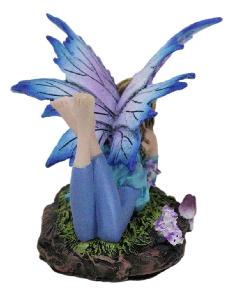 Fantasy Pink and Blue Girl Princess Fairy Lying On Lavender Meadows Figurine