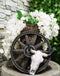 Rustic Western Cow Skull Wagon Wheel By Tree Trunk Decorative Planter Or Vase