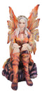 Goddess of Fire Elemental Pixie Fairy in Ember Pyre Dress Sitting Figurine