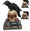 Raven Crow Perching On Skull With LED Eyes And Spell Books Of Prophecy Figurine