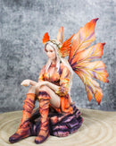 Goddess of Fire Elemental Pixie Fairy in Ember Pyre Dress Sitting Figurine