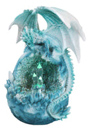 Winter Snow Dragon Resting On Frozen Snow Geode Egg With LED Crystals Figurine