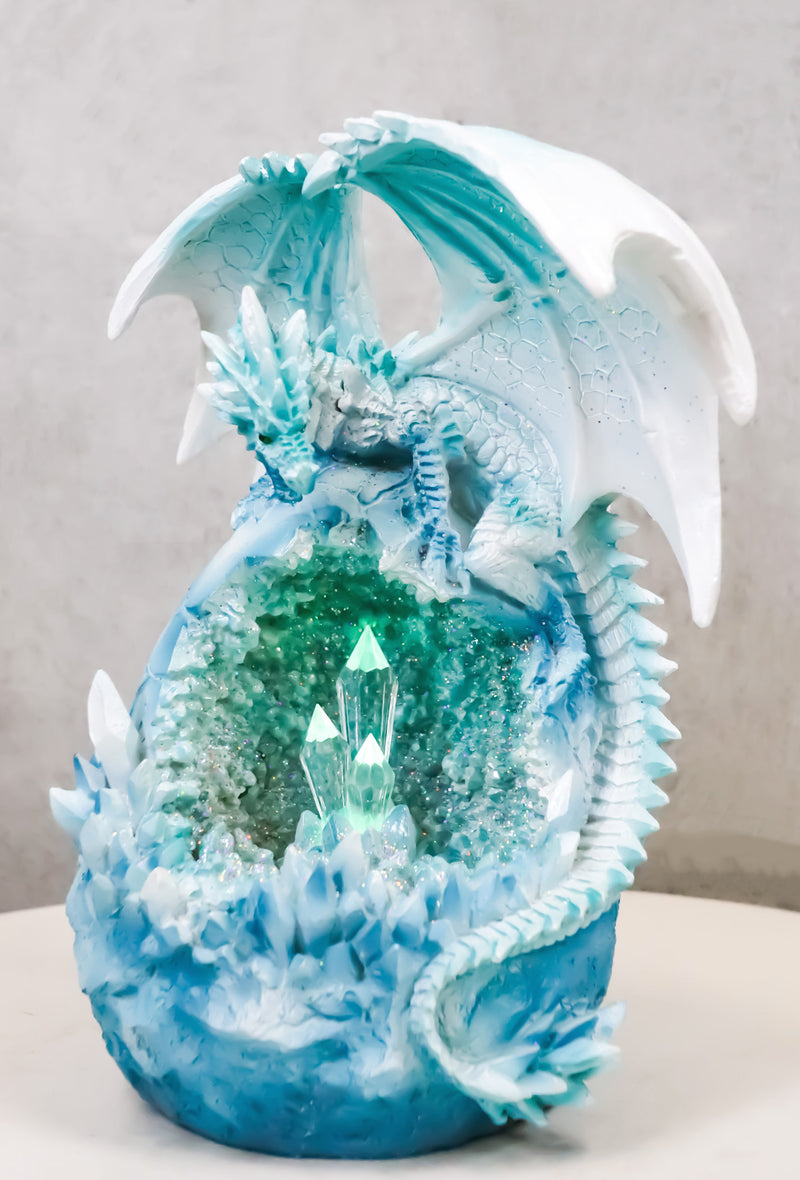 Winter Snow Dragon Resting On Frozen Snow Geode Egg With LED Crystals Figurine