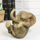 Whimsical Safari Savanna Baby Calf Elephant Cradling On Its Back Figurine