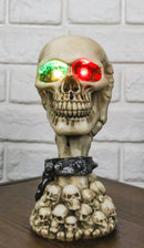 Shackled Skeleton Hand Holding Skull with LED Eyes With Morphing Skulls Figurine