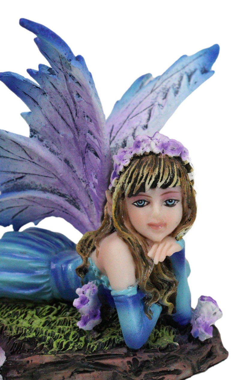 Fantasy Pink and Blue Girl Princess Fairy Lying On Lavender Meadows Figurine