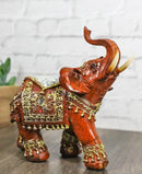 Faux Wood Trunk Up Elephant with Golden Scrollwork And Crushed Glass Figurine