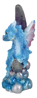 Pastel Blue Dream Baby Dragon Wyrmling Sitting On Purple Crescent Moon Figurine