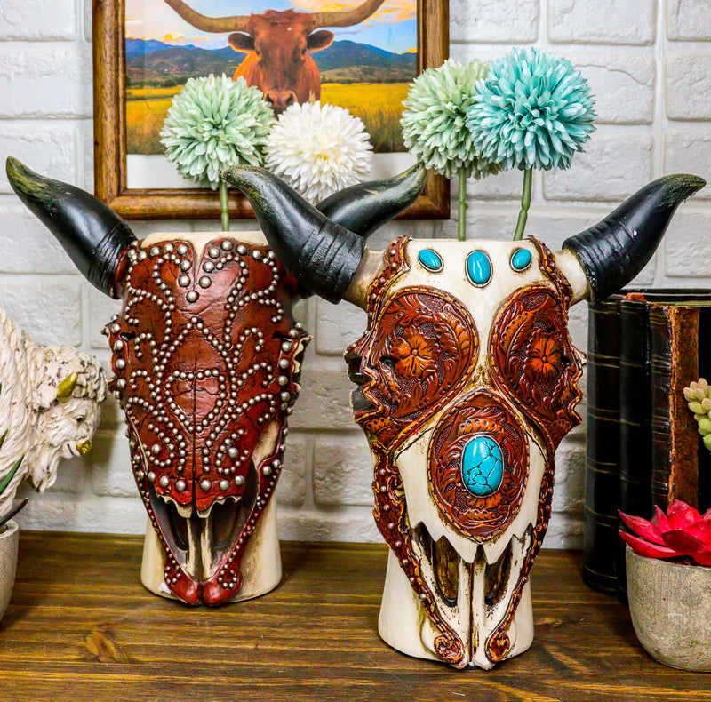 Set Of 2 Southwest Cow Skulls With Turquoise Rocks Tooled Leather Vase Figurines