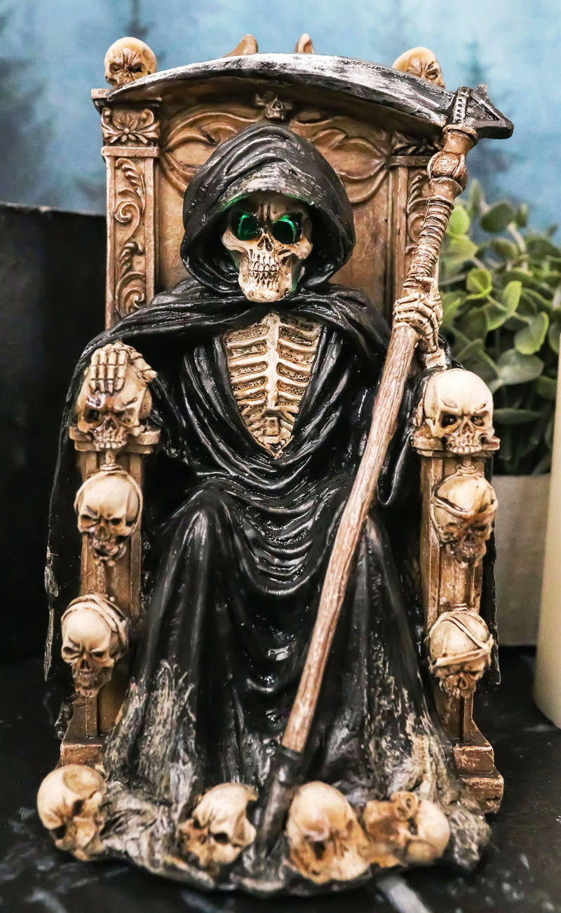 Dark Lord Grim Reaper Skeleton With LED Eyes Seated On Skulls Throne Figurine