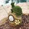 Solar Powered Tortoise On Garden Rock Sculpture In Flocked Artificial Grass Deco