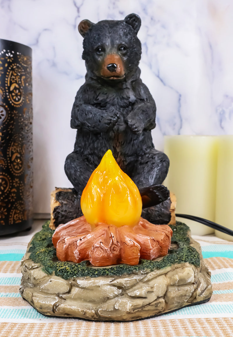 Ebros Rustic Forest Black Bear Warming Hands By Campfire LED Night Light Statue