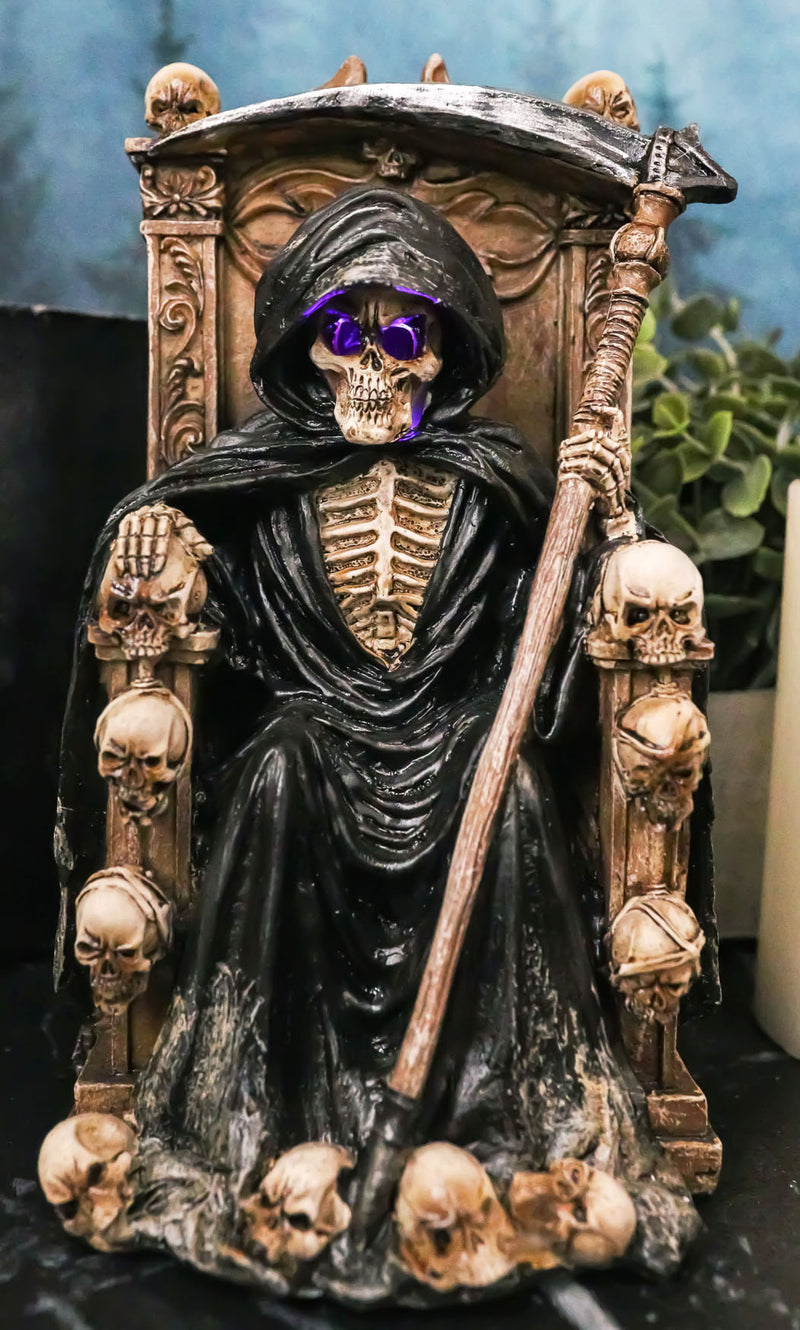 Dark Lord Grim Reaper Skeleton With LED Eyes Seated On Skulls Throne Figurine