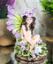 Whimsical Violet Purple Girl Fairy Sitting On Pansy Garden Bed Pixie Figurine