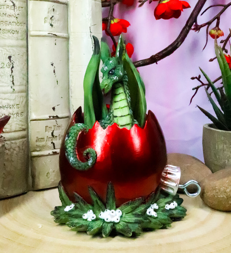 Ebros Amy Brown Holiday Green Mischief Dragon Hiding in Red Egg Ornament Figurine