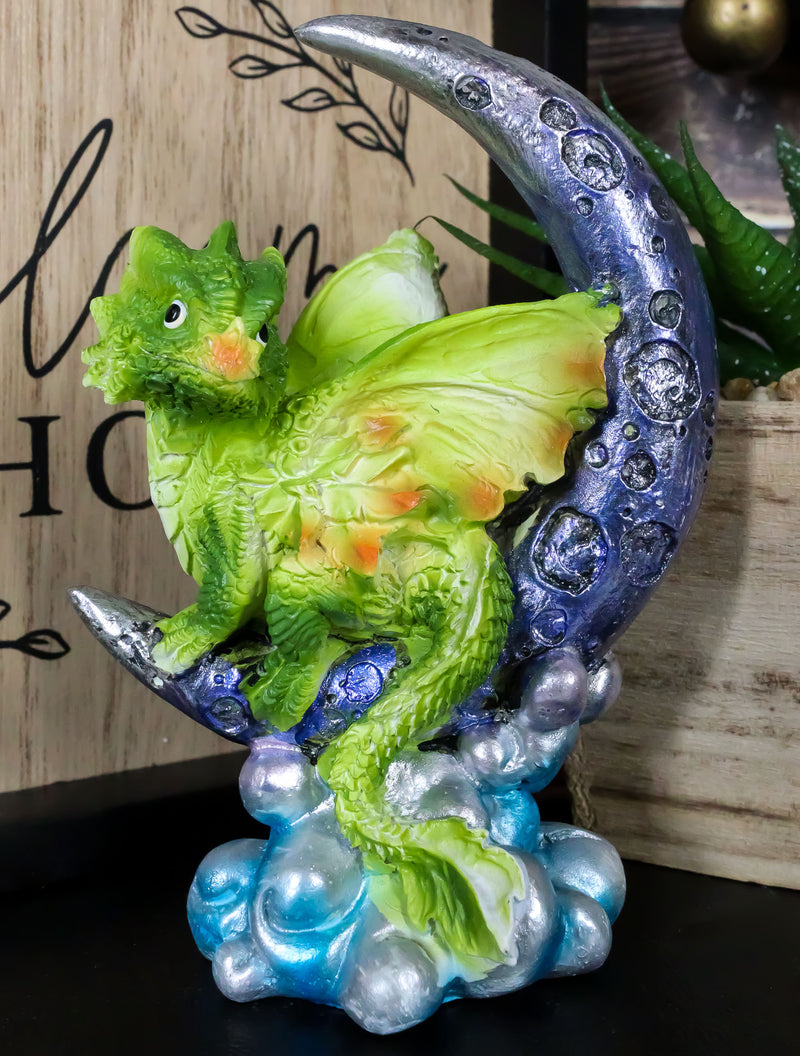 Pastel Green Dream Baby Dragon Wyrmling Sitting On Purple Crescent Moon Figurine