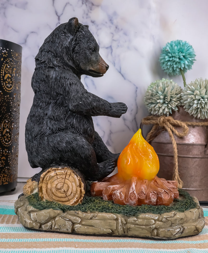 Ebros Rustic Forest Black Bear Warming Hands By Campfire LED Night Light Statue