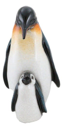 North Pole Family Cute Emperor Penguin Father And Chick Cuddle Time Figurine